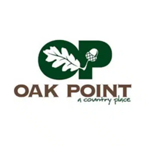 Logo featuring the initials "OP" with an oak leaf and acorn, and the text "OAK POINT a country place" below in brown and green letters.